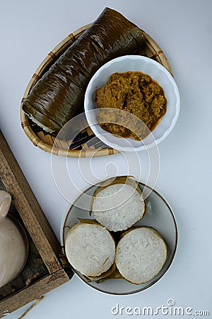 Glutinous rice is wrapped with banana leaf in bamboo culm, popular during Eid Mubarak Stock Photo