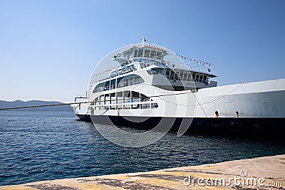 Glyfa village, Greece - August 15, 2023: Ferryboat at the harbour of Glyfa in Greece Editorial Stock Photo