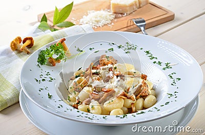 Gnocchi with chanterelles Stock Photo