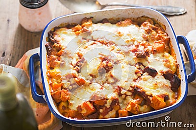 Gnocchi, pumpkin, chickpeas bale in tomato sauce with cheese Stock Photo