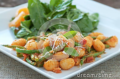 Gnocchi with Rocket Salad Stock Photo