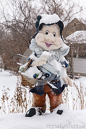 The gnome under snow Stock Photo
