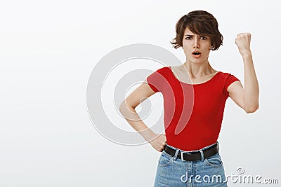 Go girls we win. Encouraged motivated good-looking determined young woman pixie short haircut fighting human lgbtq Stock Photo