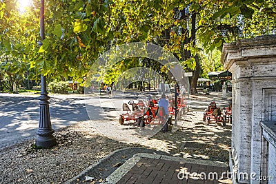 Go-kart rental attraction inside the park and grounds of the Villa Borghese in Rome, Italy Editorial Stock Photo