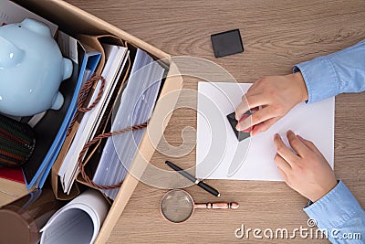 Go through the resignation procedure and quit your job Stock Photo