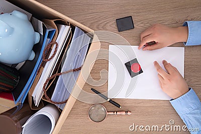 Go through the resignation procedure and quit your job Stock Photo