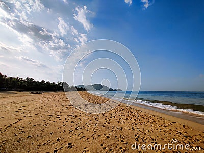 Goa beach dusk water ocean Stock Photo