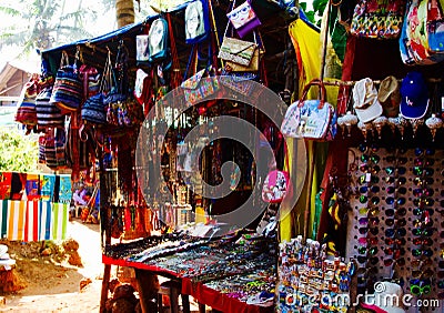 Goa, India - December 16, 2016: Women`s and men`s accessories at a local vendor`s shop on the way to Anjuna beach. Editorial Stock Photo