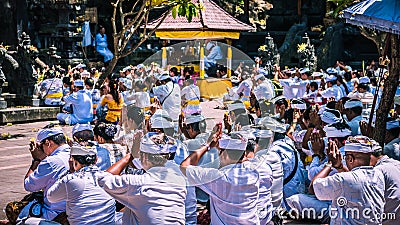 GOA LAWAH, BALI, INDONESIA - November 3, 2016: Balinese praying on ceremony at Pura Goa Lawah temple, Bali, Indonesia Editorial Stock Photo