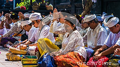 GOA LAWAH, BALI, INDONESIA - November 3, 2016: Balinese praying on ceremony at Pura Goa Lawah temple, Bali, Indonesia Editorial Stock Photo