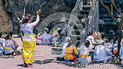 GOA LAWAH, BALI, INDONESIA - November 3, 2016: Balinese praying on ceremony at Pura Goa Lawah temple, Bali, Indonesia Editorial Stock Photo