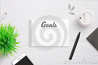 Goals text on notepad page header. Annual writing list Stock Photo