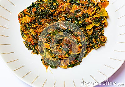 Goat meat Efo riro Nigerian Yoruba cuisine Stock Photo