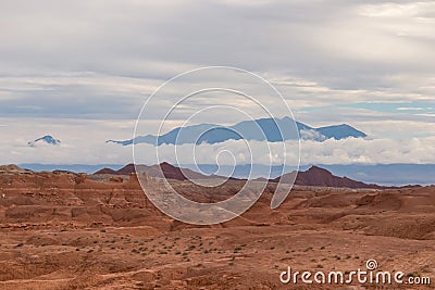 Goblin Valley - Panoramic view of the cloud covered Henry mountain range seen from the Goblin Valley State Park near Hanksville Stock Photo