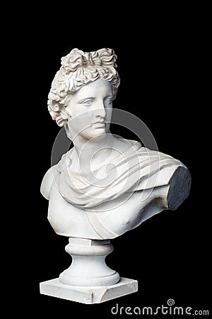 God Apollo bust sculpture. Ancient Greek god of Sun and Poetry Plaster copy of a marble statue isolated on black. Stock Photo