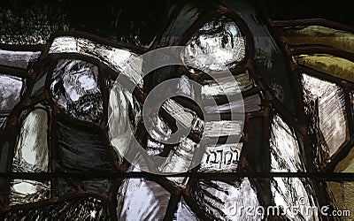 God, the Creator of all life, detail of stained glass window in church of Saint John in Piflas, Germany Editorial Stock Photo