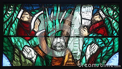 God, the Creator of all life, detail of stained glass window in church of Saint John in Piflas, Germany Editorial Stock Photo