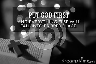 God inspirational quote - Put God first and everything else will fall into proper place. With holy cross person reading bible book Stock Photo