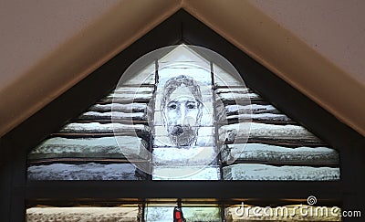 God leads his own to completion in all his glory, detail of stained glass window in church of Saint John in Piflas, Germany Stock Photo