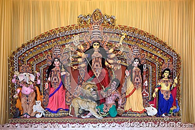 Goddess Durga idol decorated at puja pandal in Kolkata, West Bengal, India. Durga Puja is biggest religious festival of Hinduism Stock Photo