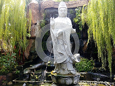 Goddess of Mercy Kuanyin Statue Fountain Stock Photo