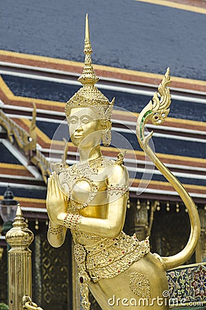 The Goden Kinnaree in Temple of The Emerald Buddha (Wat Phra Kaew), BANGKOK, THAILAND Stock Photo