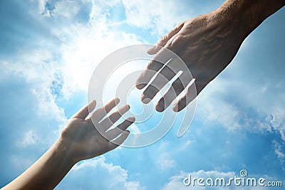 Godparent with child and beautiful blue sky with fluffy clouds on background, closeup Stock Photo