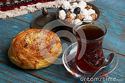 Gogal and glass of black tea Stock Photo