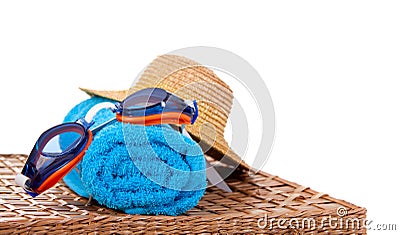 Goggles and a straw hat Stock Photo