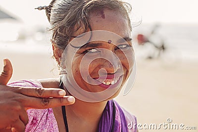 Indian woman jewelry seller portrait at Kudli beach resort in Gokarna city Editorial Stock Photo