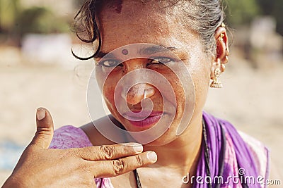 Indian woman jewelry seller portrait at Kudli beach resort in Gokarna city Editorial Stock Photo