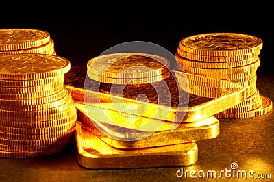 Gold bar and coins Stock Photo