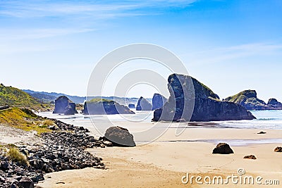 Gold Beach and Cave Rock Stock Photo