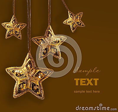 Gold beaded stars isolated on white Stock Photo