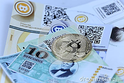 Gold Bitcoin and banknotes Stock Photo