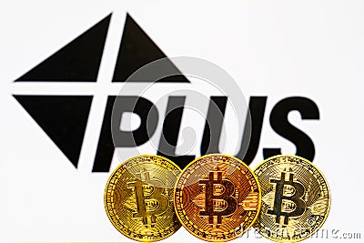 Gold Bitcoin coins with the Visa logo Editorial Stock Photo