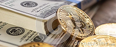 Gold Bitcoins on American Banknotes Stock Photo