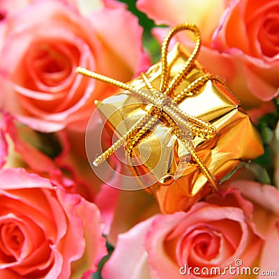 Gold box and rosebuds Stock Photo