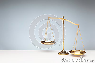 Gold brass balance scale Stock Photo