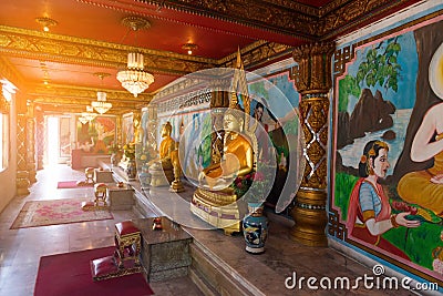 Gold Buddha statues inside chinese temple Editorial Stock Photo