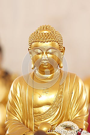 The gold Buddhist saint. Stock Photo