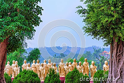 Gold buddhist statues with nature Stock Photo