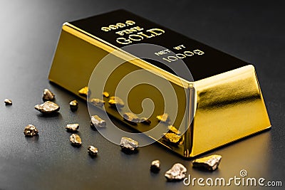 Gold bullion and nuggets Stock Photo