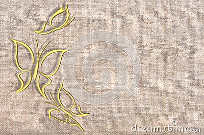 Gold butterfly on background fabrics gray Stock Photo