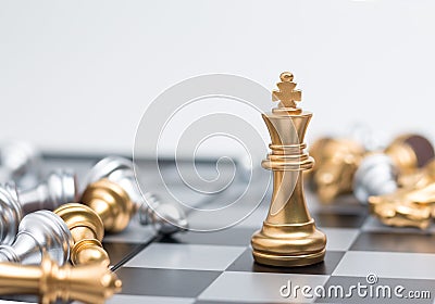 Gold Chess on chess board game for business metaphor leadership Stock Photo