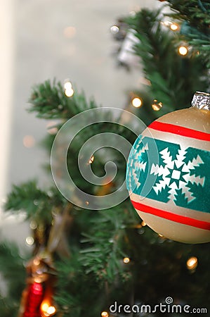 Gold Christmas tree ball ornament with lites Stock Photo