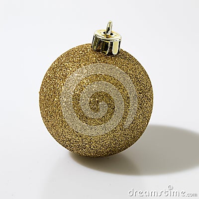 Gold christmass ball in a white background Stock Photo