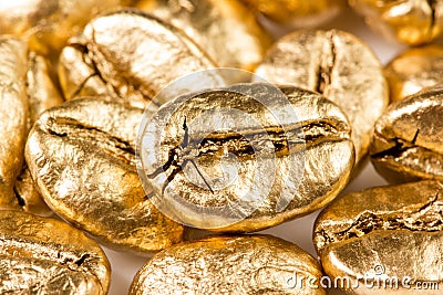 Gold coffee beans Stock Photo