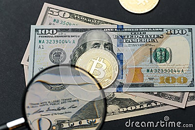 The gold coin of bitcoin lies on on American dollar bills. Online payment technology, digital wallet, computer financial, cryptocu Stock Photo
