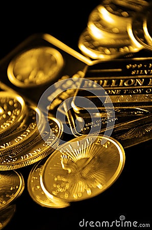 Gold Coins and Bullion for Wealth Stock Photo